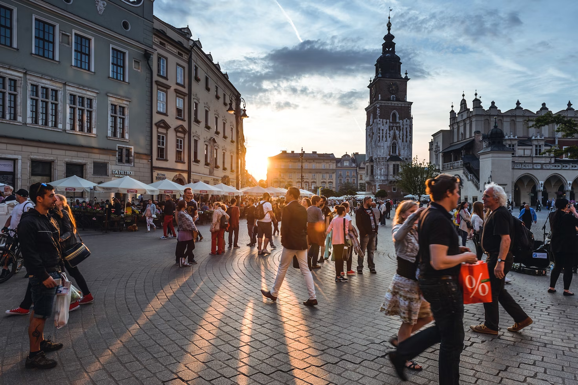 Tourists on Main Market Square in Krakow, Poland